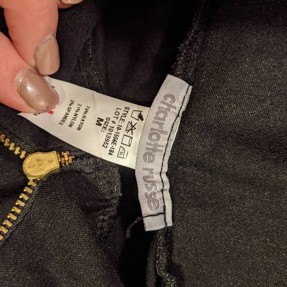 Black skinny pants with high waist zipper cross